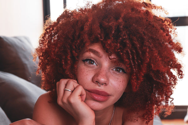 healthy hair tips cover of woman with curly hair